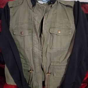 Olive green coat with black sleeves